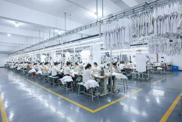 Guangzhou Odin Apparel Co., Ltd.， línea de producción del fabricante