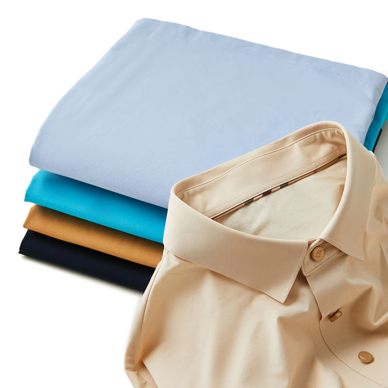 OEM ODM camisetas de polo bordadas para hombres diseños personalizados color cuello con botón delantero