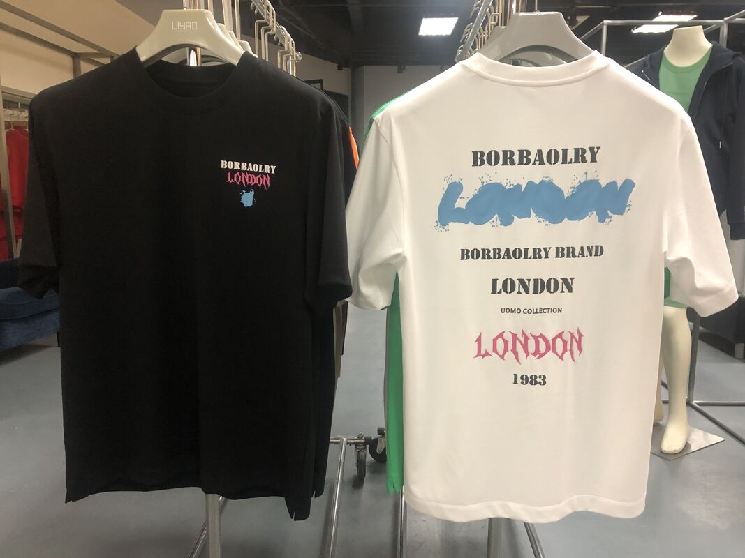 Camiseta negra y blanca de hombre con hombros caídos y peso pesado con bordado y estampados de logotipo personalizados de fábrica en oferta